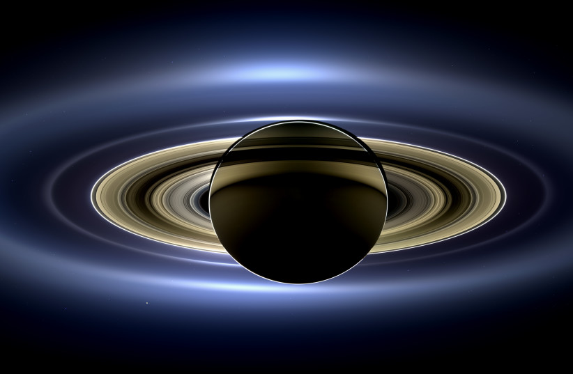  On July 19, 2013, in an event celebrated the world over, NASA's Cassini spacecraft slipped into Saturn's shadow and turned to image the planet, seven of its moons, its inner rings -- and, in the background, our home planet, Earth. (credit: NASA / JPL-Caltech / Space Science Institute)