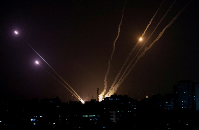  Rockets are fired from Gaza into Israel, in Gaza May 13, 2023.  (credit: MOHAMMED SALEM/REUTERS)