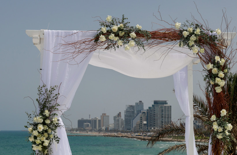  A Jewish wedding Chuppah is seen in Tel Aviv on May 14, 2023 (credit: MARC ISRAEL SELLEM/THE JERUSALEM POST)