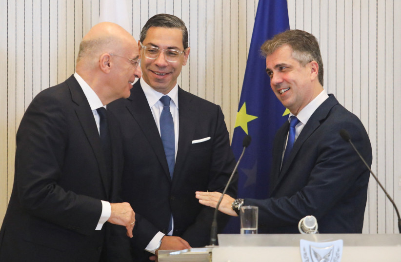  Cyprus Foreign Minister Constantinos Kombos, Greek Foreign Minister Nikos Dendias and Israeli Foreign Minister Eli Cohen talk after a news conference at the Presidential Palace in Nicosia, Cyprus March 31, 2023 (photo credit: REUTERS)