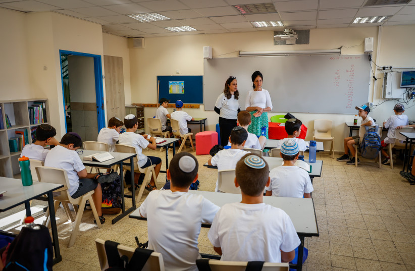 Students sitting in a classroom in Israel. (photo credit: GERSHON ELINSON/FLASH90)