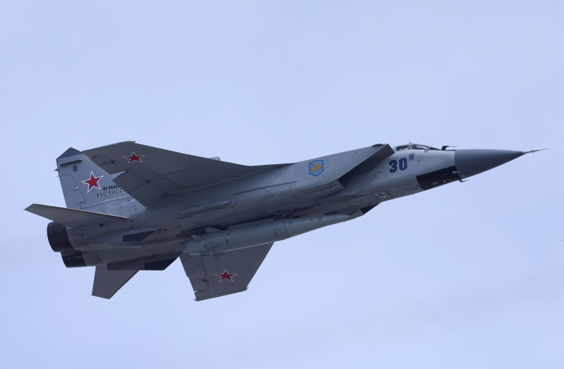  A Russian MiG-31 fighter jet equipped with a Kinzhal hypersonic missile flies over Red Square during a rehearsal for a flypast, part of a military parade marking the anniversary of the victory over Nazi Germany in World War Two, in central Moscow, Russia May 7, 2022. (credit: REUTERS/MAXIM SHEMETOV)