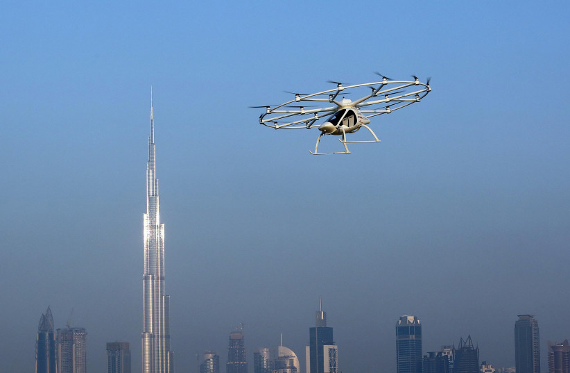  The flying taxi is seen in Dubai, United Arab Emirates September 25, 2017.  (credit: REUTERS/SATISH KUMAR)