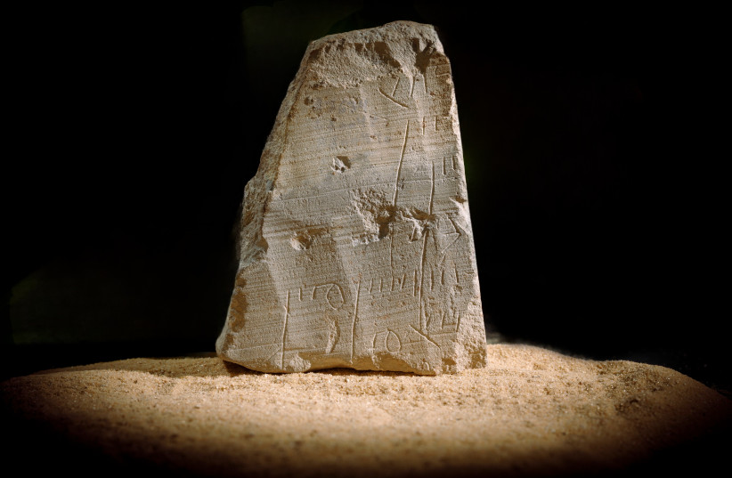  The inscription carrying the financial record that was found in the City of David in Jerusalem. (photo credit: ELIYAHU YANAI/CITY OF DAVID)
