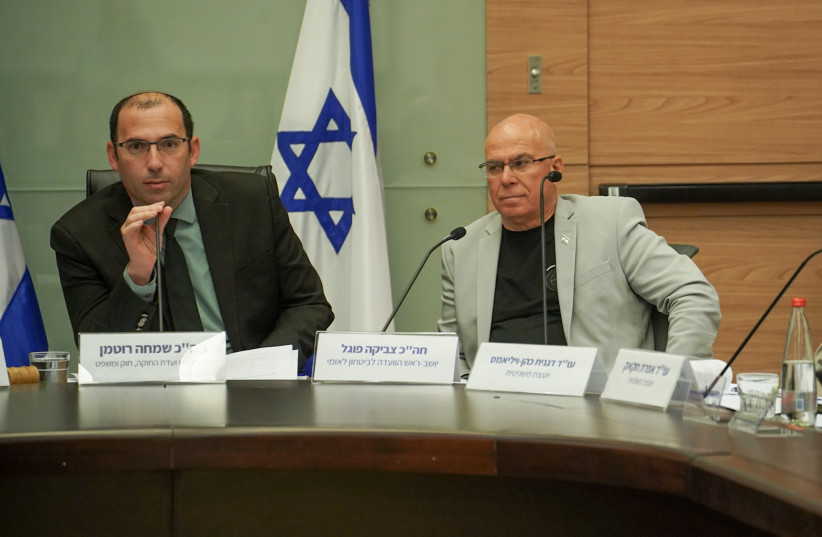  Israeli MKs Simcha Rothman (L) and Zvika Fogel are seen sitting at a special joint session of the Knesset Constitution, Law and Justice Committee and National Security Committee in Jerusalem, on May 16, 2023. (photo credit: DANI SHEM TOV/KNESSET SPOKESPERSONS OFFICE)