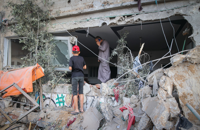  THE RUBBLE from a home struck in an Israeli attack, last Saturday, in Gaza City. (photo credit: ATIA MOHAMMED/FLASH90)