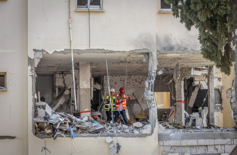  THE BUILDING in Rehovot hit by a rocket fired from the Gaza Strip, killing one person, last week: Islamic Jihad killed only civilians – at least four Palestinians in Gaza, a Palestinian in Israel and an Israeli in Rehovot. (photo credit: YOSSI ALONI/FLASH90)