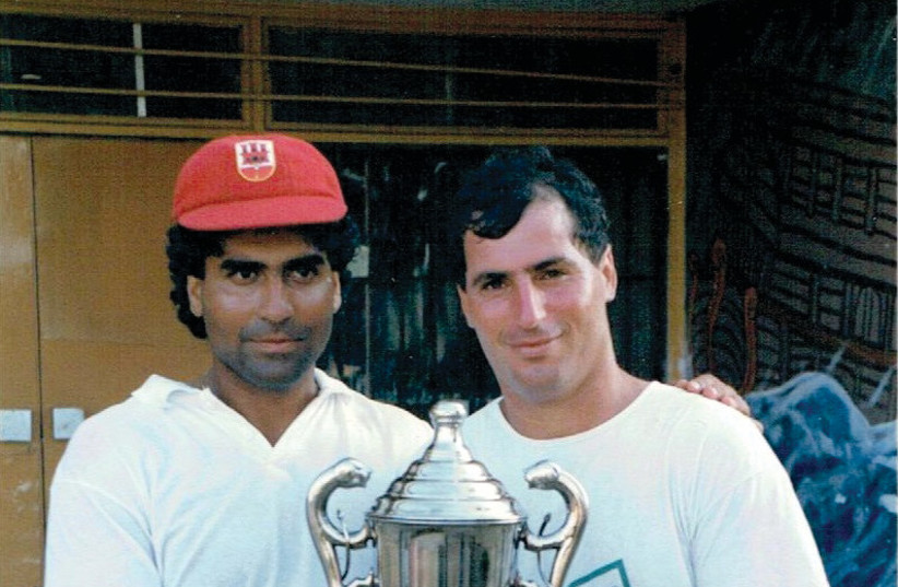  Winning the cup: Hillel Oscar with Felix Avitan, chairman of Team Ashdod and close friend. (credit: Felix Avitan)