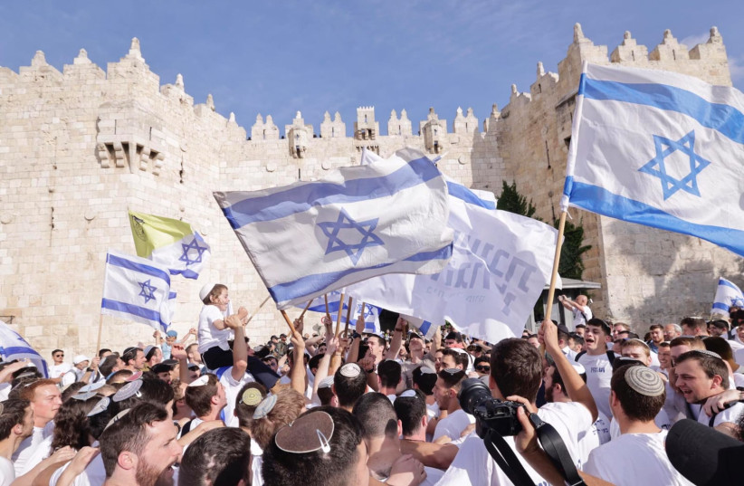  The Jerusalem Day flag march in front of the Damascus Gate, May 18, 2023 (credit: MARC ISRAEL SELLEM)