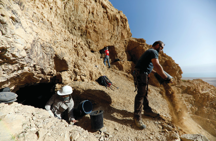 ARCHAEOLOGICAL DIG in 2019 near caves in the Qumran area of Israel where the Dead Sea Scrolls were discovered. The author uses the Dead Sea Scrolls as a key element to support his arguments.
