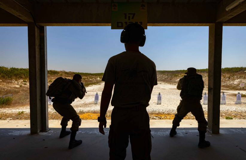  Israeli Golani soldiers seen during a firing training in a fire range at the Golani divisional training base, on August 1, 2021.  (credit: OLIVIER FITOUSSI/FLASH90)