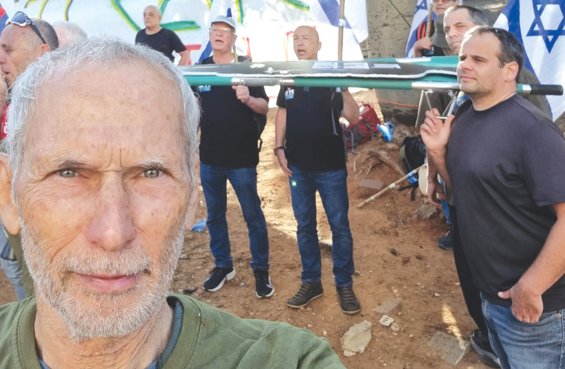  OMER BAR-LEV attends a protest with other IDF veterans against the government’s planned judicial overhaul and mass military exemptions in the haredi sector, in Bnei Brak, earlier this month. (photo credit: OMER BAR-LEV/TWITTER)