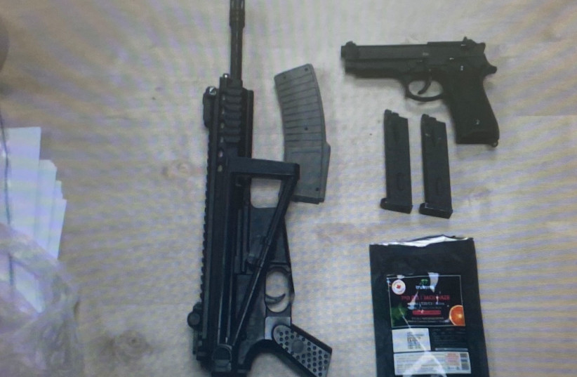 Weapons seized by police at scene of domestic violence incident near Jerusalem, May 22, 2023 (credit: ISRAEL POLICE)