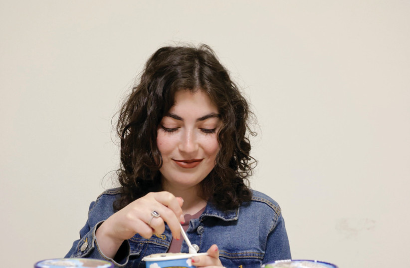  Ariella Marsden is hard at work testing Ben & Jerry's. Journalism requires sacrifices. (credit: MARC ISRAEL SELLEM)