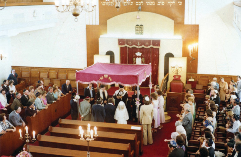 FOR MANY converts, the original impetus was not actually a Jewish partner. Pictured: Huppa in Cape Town, 1979. (photo credit: Wikimedia Commons)