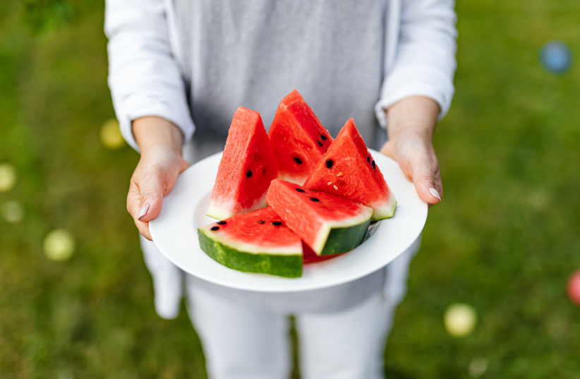 Nothing cools you down on a hot summer day quite like fresh, sweet watermelon (illustrative) (photo credit: PEXELS)