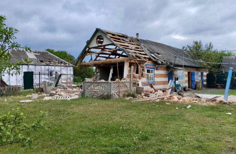 A view shows damaged buildings, after anti-terrorism measures introduced for the reason of a cross-border incursion from Ukraine were lifted, in what was said to be a settlement in the Belgorod region, in this handout image released May 23, 2023.