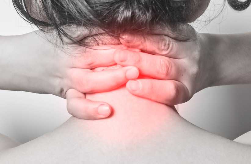 Neck and back pain (illustrative).  (photo credit: MARCO VERCH PROFESSIONAL PHOTOGRAPHER AND SPEAKER/FLICKR)