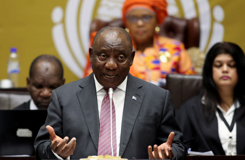  South African President Cyril Ramaphosa replies to questions in parliament in Cape Town, South Africa, May 11, 2023. (credit: ESA ALEXANDER/REUTERS)