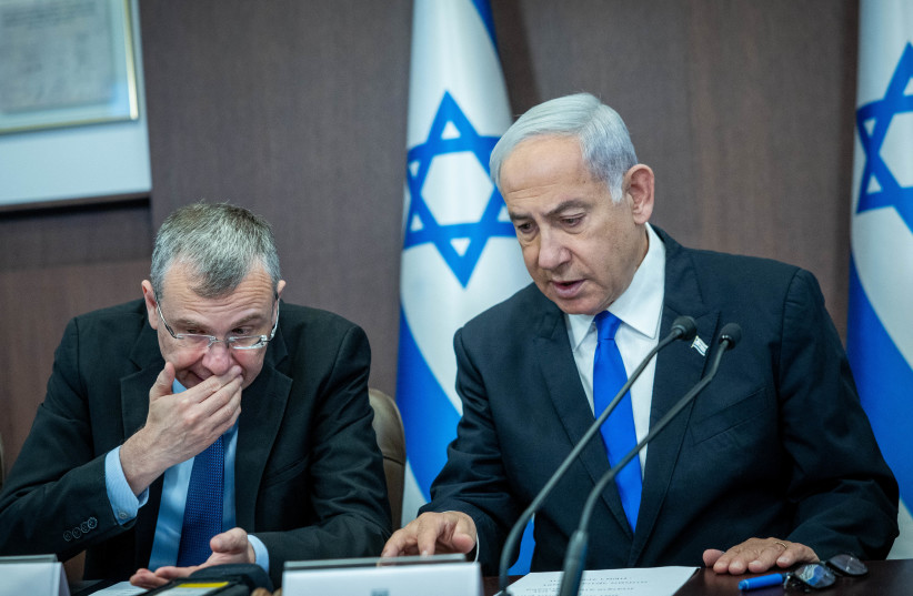  Prime Minister Benjamin Netanyahu speaks with Israeli Minister of Justice Yariv Levin during a government conference at the Prime Minister's office in Jerusalem on May 28, 2023 (credit: YONATAN SINDEL/FLASH90)