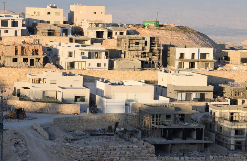  A construction site of a new residential neighborhood at the mixed religious-secular Jewish settlement in the West Bank Kfar Adumim, March 9, 2023. (credit: GILI YAARI/FLASH90)