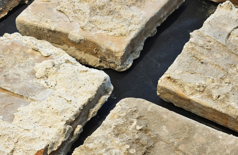   Ancient bricks containing Roman Legion symbols seized from eastern Jerusalem (credit: ISRAEL ANTIQUITIES AUTHORITY.)