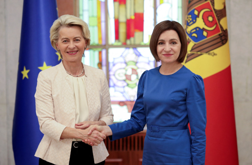  Moldovan President Maia Sandu and European Commission President Ursula von der Leyen shake hands during a news conference in Chisinau, Moldova, May 31, 2023. (credit: VLADISLAV CULIOMZA / REUTERS)