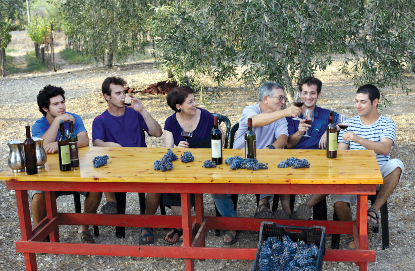  THE ZAFRIRIM Winery team enjoys a well-earned breather and a tasty aromatic beverage. (credit: INBAL ROSE)