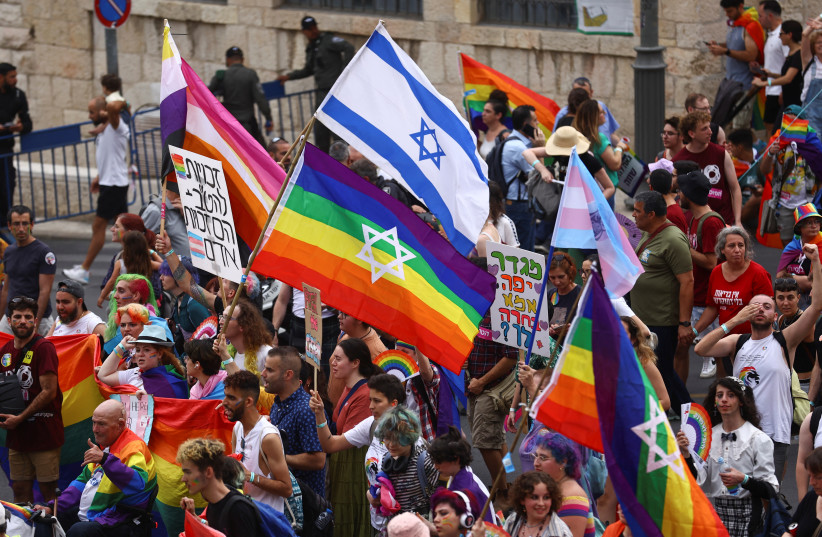  Israelis march in Jerusalem during the pride march on June 1, 2023 (credit: REUTERS/Ronen Zvulun)