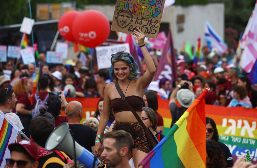  Israelis march in Jerusalem during the pride march on June 1, 2023 (credit: REUTERS/Ronen Zvulun)