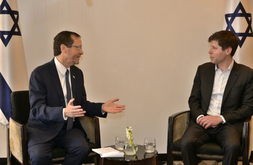  President Herzog (left) speaks with OpenAI CEO Sam Altman (right). (credit: AMOS BEN-GERSHOM/GPO)