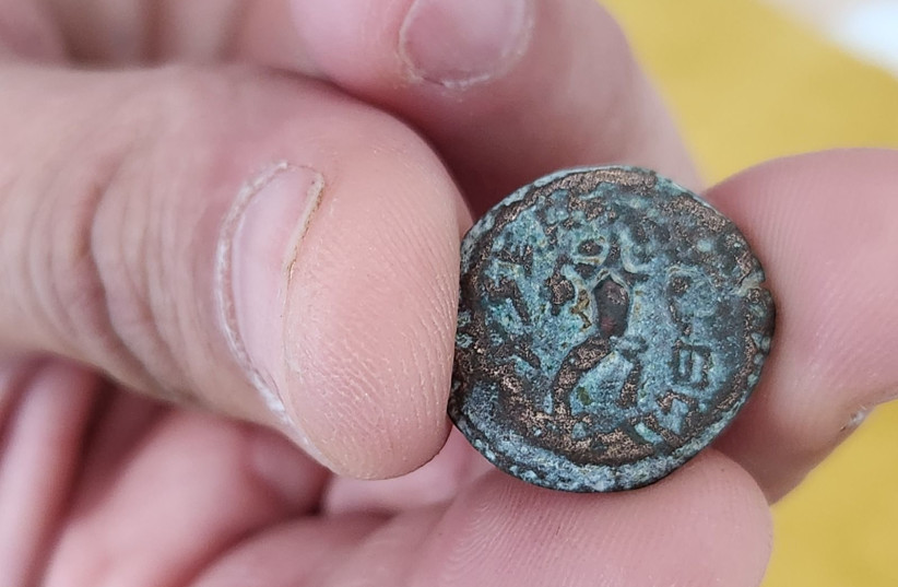  An ancient coin from the reign of the last Jewish king, Antigonus II Mattathias is seen after having been recovered from an alleged thief in eastern Jerusalem. (credit: Israel Antiquities Authority)