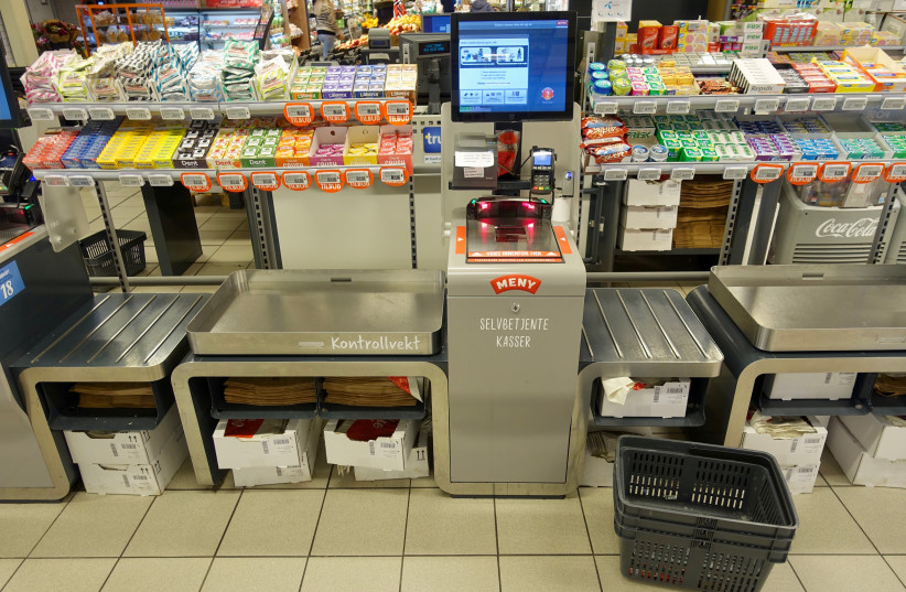  Self-service check-out payment machine (credit: Wikimedia Commons)