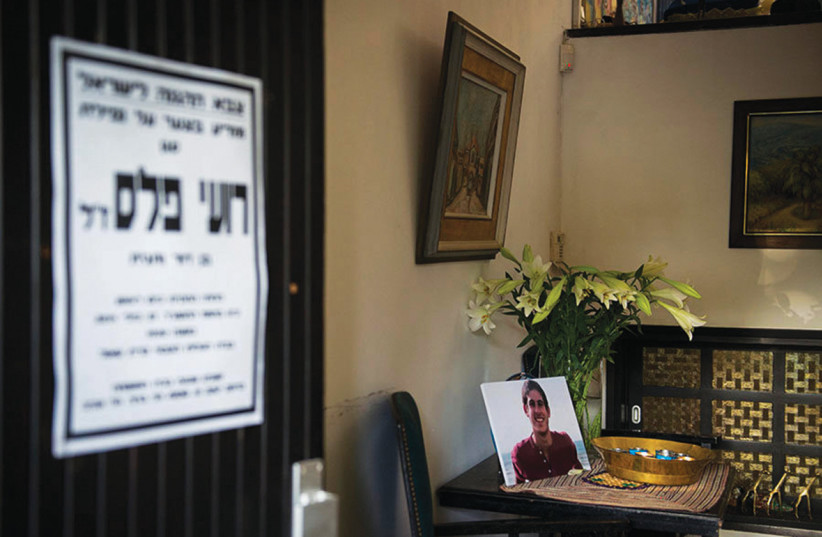 OBITUARY ON the front door of the Peles family home, 2014, for Roy Peles, 21, who had been killed the previous month in combat.