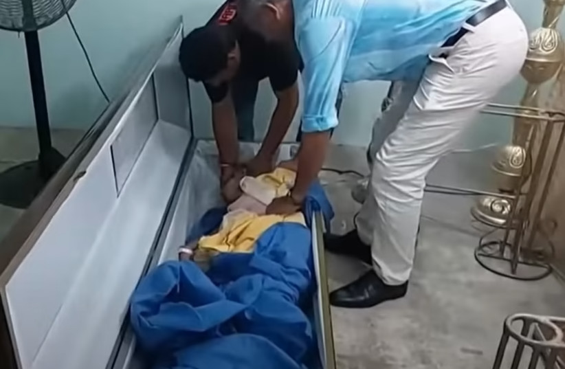  A 76-year-old woman, who was declared dead at a hospital in Ecuador's Babahoyo, shocked her family when she knocked on her coffin during her wake on June 9.  (credit: Walla)