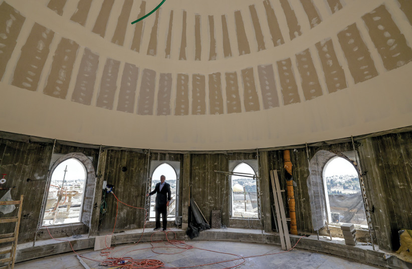  Sherr stands inside the Tiferet Israel Synagogue dome, which is under construction. (credit: MARC ISRAEL SELLEM)