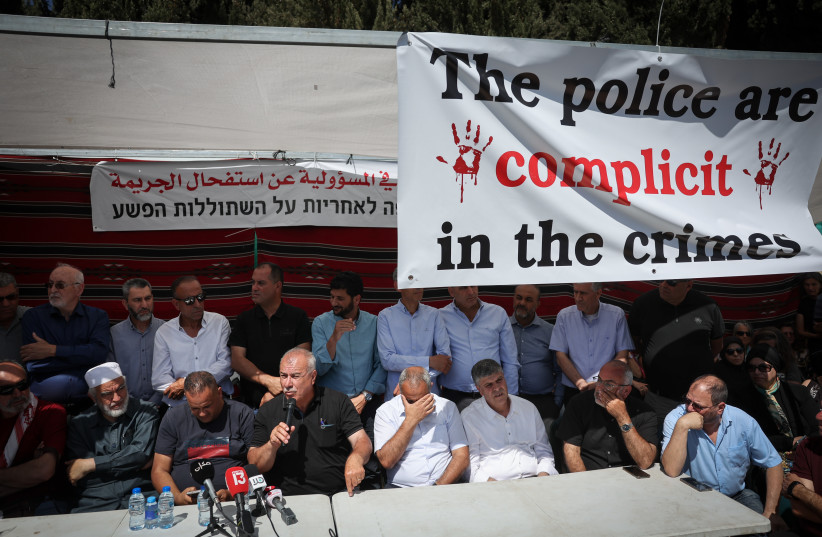  Former Israeli MK Mohammed Barakeh and members of the Arab community hold a press conference in a protest tent they set up outside of the office of the Prime Minister in Jerusalem, protesting against the violence in their community May 31, 2023 (credit: YONATAN SINDEL/FLASH90)