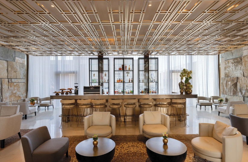  The bar, lobby and lounge at the Theatron Hotel. (credit: THEATRON HOTEL)