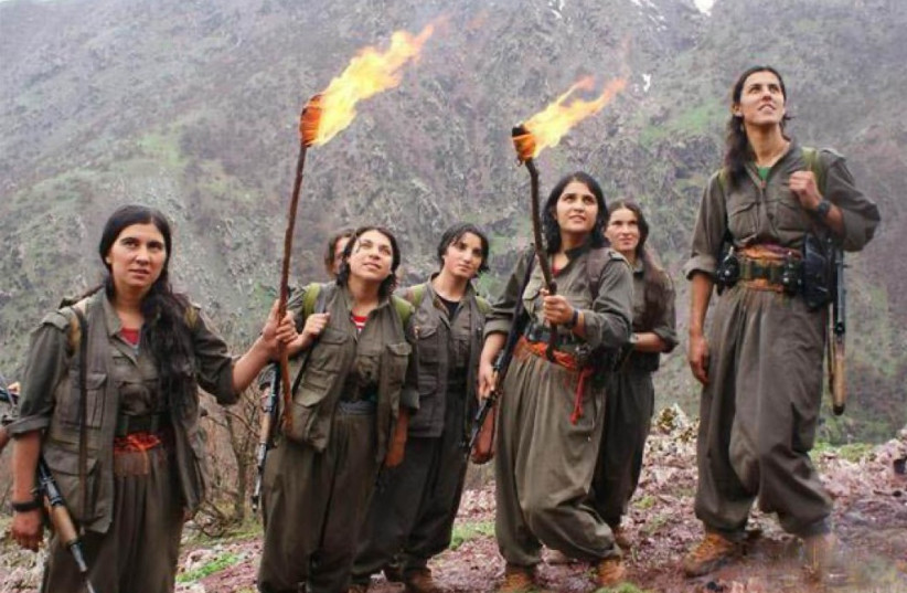  PJAK FIGHTERS observe Newroz, a Kurdish spring festival, Qandil Mountains, 2021. (credit: PJAK)