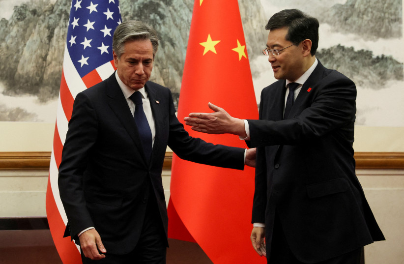 U.S. Secretary of State Antony Blinken meets with China's Foreign Minister Qin Gang at the Diaoyutai State Guesthouse in Beijing, China, June 18, 2023. (credit: REUTERS/LEAH MILLIS/POOL)