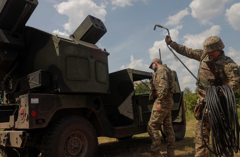 Ukrainian servicemen prepare an AN/TWQ-1 Avenger mobile air defence missile system for work during their combat shift, amid Russia's attack on Ukraine, outside of Kyiv, Ukraine June 16, 2023 (credit: REUTERS/ANNA VOITENKO)