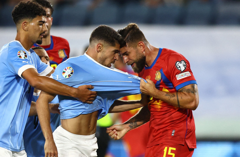  Andorra's Moises San Nicolas remonstrates with Israel's Manor Solomon at the UEFA Euro 2024 Qualifier - Group I - Israel v Andorra - Teddy Stadium, Jerusalem, Israel - June 19, 2023 (credit: RONEN ZVULUN/REUTERS)