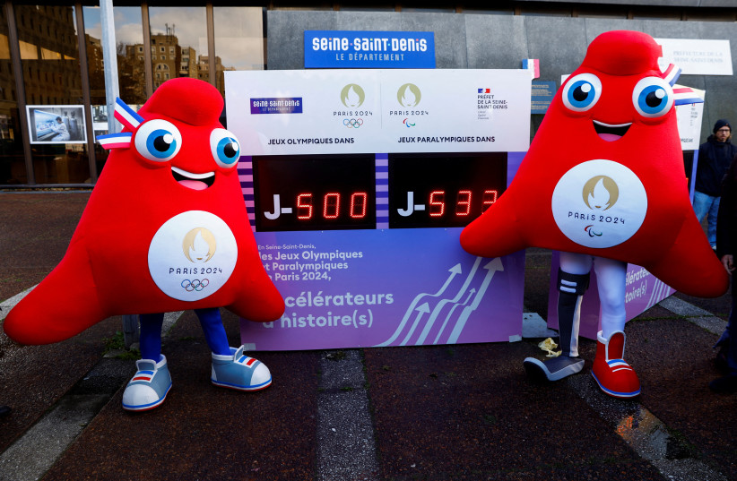  Olympic and Paralympic mascots stand next to a countdown clock showing 500 days left until the Paris 2024 Olympic Games in Bobigny near Paris, France, March 14, 2023 (credit: Gonzalo Fuentes/Reuters)