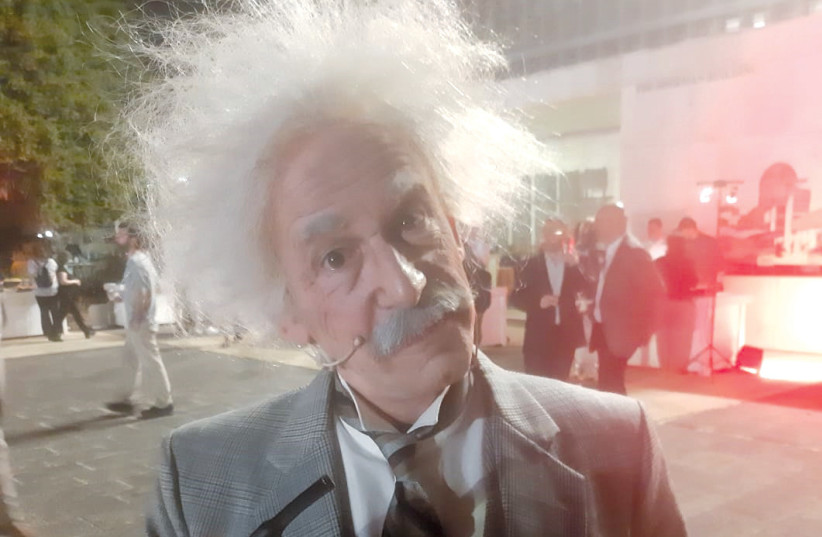  ACTOR BOBBY LAX, dressed up to take the persona of Albert Einstein, spoke on stage about the genius’s recollections and thoughts.  (credit: JUDY SIEGEL-ITZKOVICH)