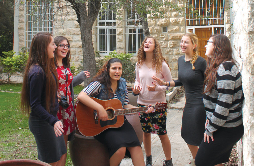  Students at Jerusalem's EVO seminary perform music for each other. (credit: EVO archives)