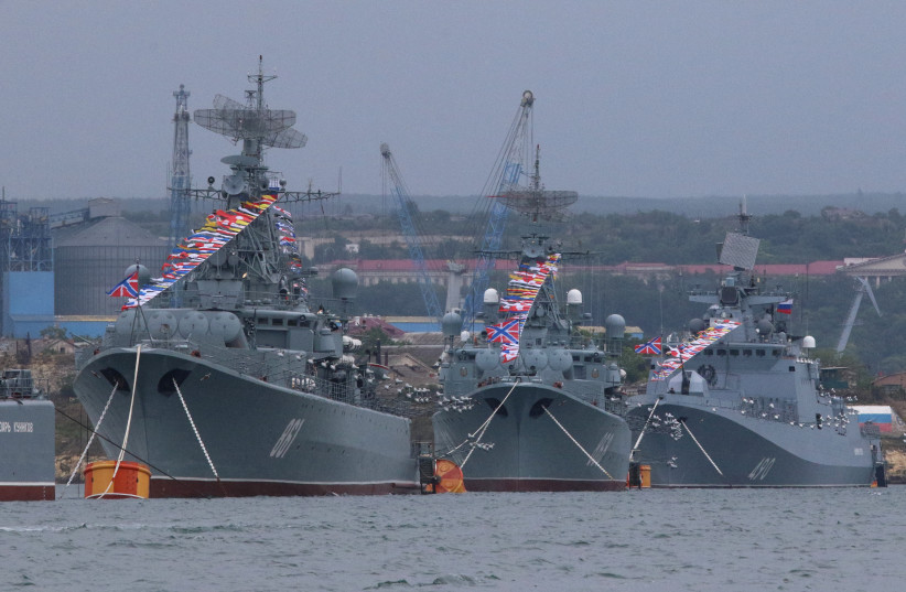 Russian Navy's frigates Ladny, Pytlivy and Admiral Essen are seen at the Bay of Sevastopol, Crimea June 24, 2020. (credit: REUTERS/ALEXEY PAVLISHAK)