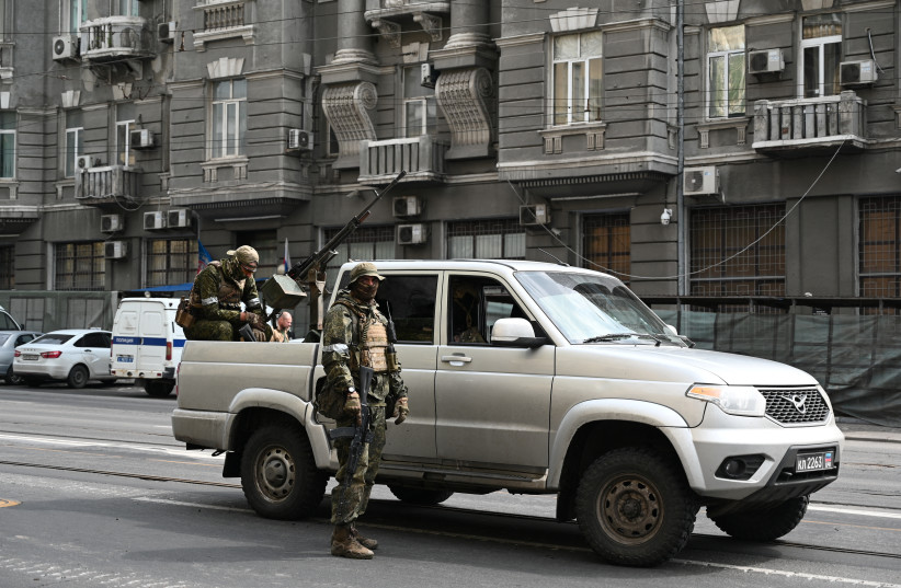  Fighters of Wagner private mercenary group are deployed in a street near the headquarters of the Southern Military District in the city of Rostov-on-Don, Russia, June 24, 2023. (credit: REUTERS/STRINGER)