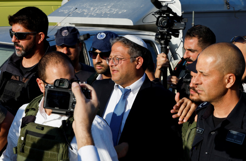  National Security Minister Itamar Ben-Gvir arrives at the scene of a suspected Palestinian shooting attack that killed four people near the Jewish settlement of Eli, in the West Bank, June 20, 2023 (credit: REUTERS/AMMAR AWAD)