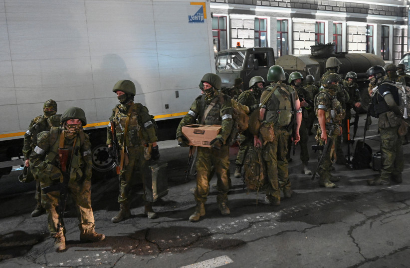  Fighters of Wagner private mercenary group pull out of the headquarters of the Southern Military District to return to base, in the city of Rostov-on-Don, Russia, June 24, 2023 (credit: REUTERS)