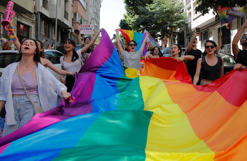  Turkey's LGBT+ community gather for a pride parade, banned by local authorities, in central Istanbul, Turkey, June 25, 2023. (credit: DILARA SENKAYA/REUTERS)